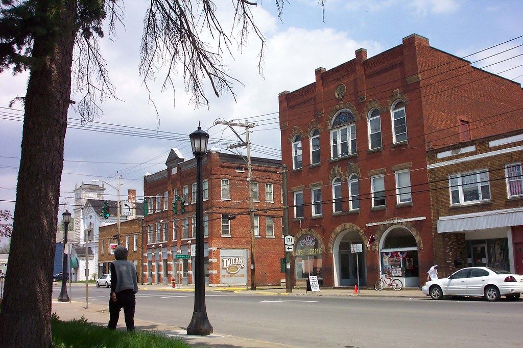 A historic brick storefront on a small-town main street